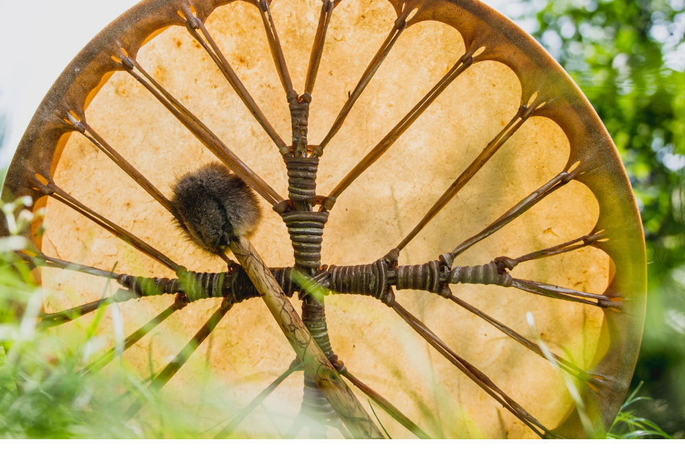 Close-up of a traditional shamanic drum used in ayahuasca retreats in Ecuador, symbolizing spiritual healing and ancestral ceremonies.